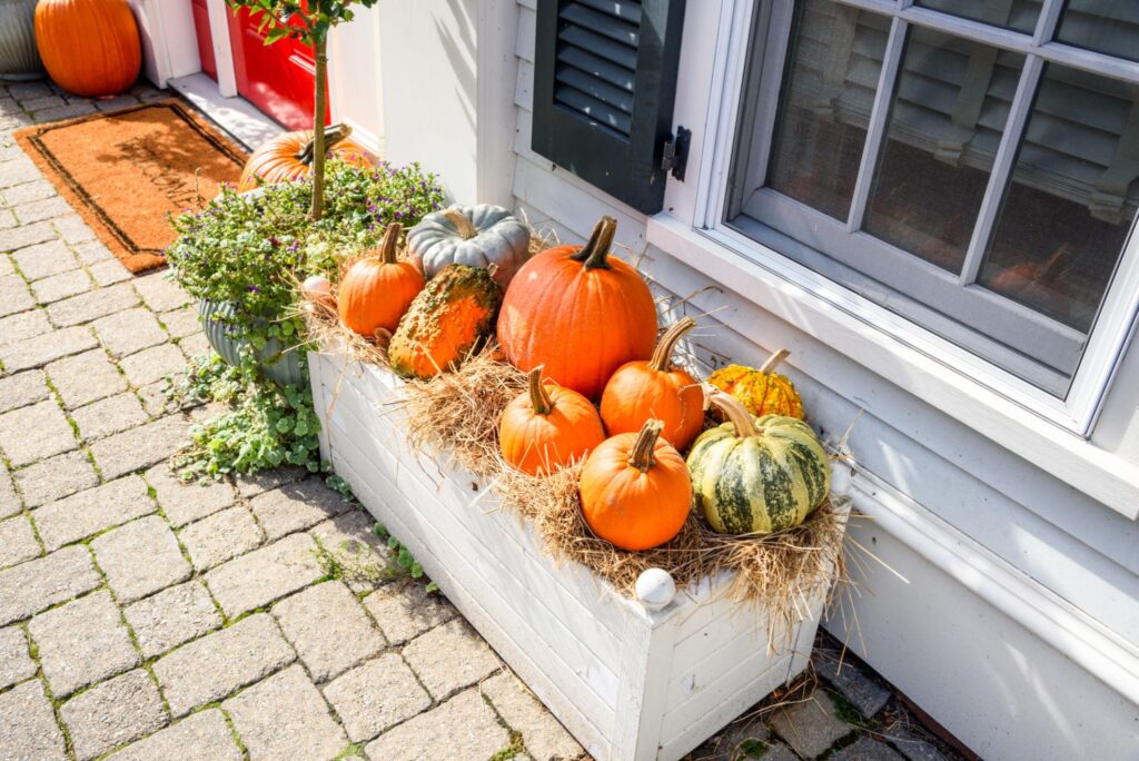 Different porch decorating styles for fall including farmhouse modern and traditional
