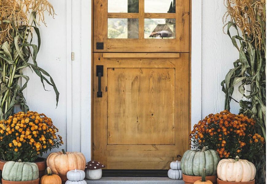 Decorating a porch for fall with pumpkins mums lanterns and autumn wreath